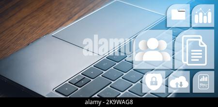 Laptop desktop with Document Management System DMS interface. Digital file storage. Database technology. Corporate business. Stock Photo