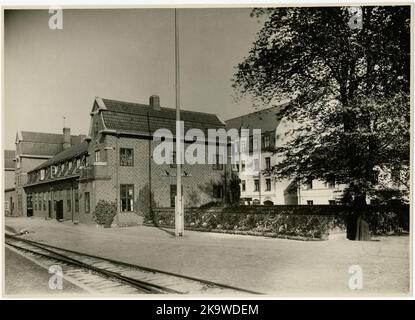 Two -storey station house in stone, built in 1863. Extended in 1876 and 1890. New station house in brick 1919, inaugurated in 1921,1914, was erected, as a provisional during the rebuilding period, a station building south of the present. It remains in 1991 and is used by the post office. At the southern entrance, SJ's plant depot was located. An older locomotive was replaced by a sevenports with a turntable Stock Photo