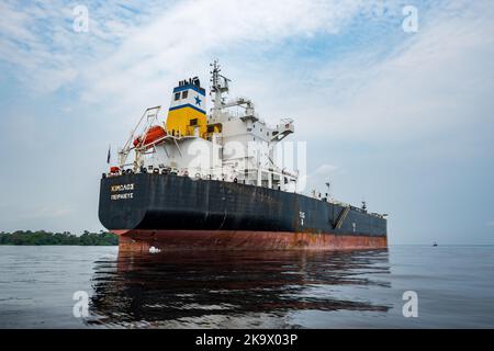 A large cargo ship on the Amazon river near Manaus, Amazonas, Brazil. Stock Photo