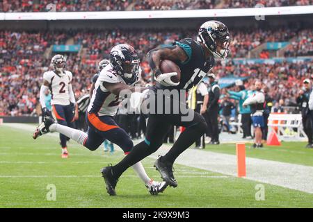 Jacksonville, FL, USA. 18th Dec, 2022. Dallas Cowboys safety Jayron Kearse  (27) is unable to defend a catch by Jacksonville Jaguars tight end Evan  Engram (17) during a game in Jacksonville, FL.