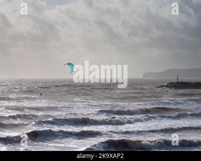 Sidmouth, Devon, 30th Oct 2022 Strong winds found excellent conditions for wind surfers at Sidmouth in Devon today. Tony Charnock/Alamy Live News Stock Photo