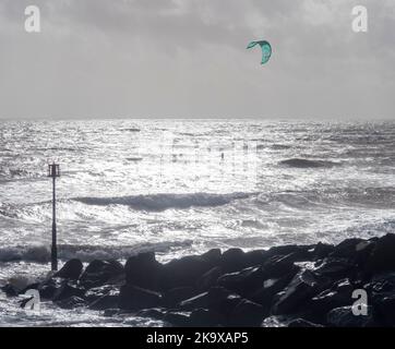 Sidmouth, Devon, 30th Oct 2022 Strong winds found excellent conditions for wind surfers at Sidmouth in Devon today. Tony Charnock/Alamy Live News Stock Photo