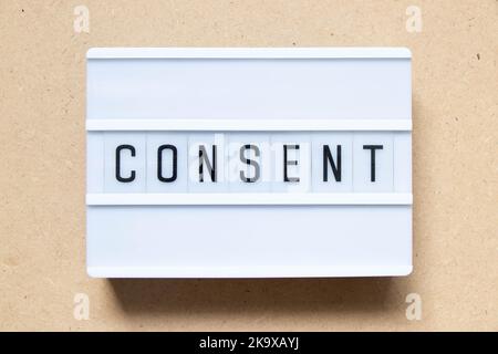 Lightbox with word consult on wood background Stock Photo