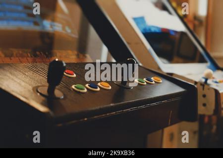 Joystick on arcade video game machine. Stock Photo