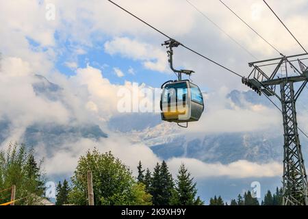 Overhead cable car to First mountain, Grindelwald, Switzerland Stock Photo