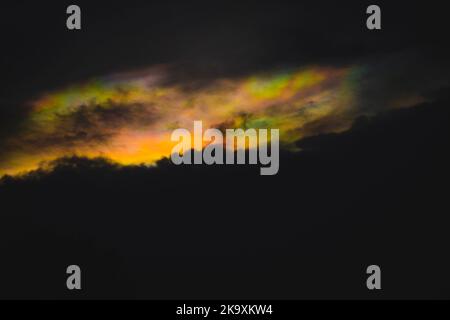 A rainbow cloud  called cloud iridescence nature background Stock Photo