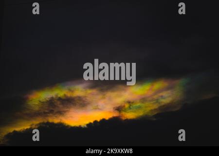A rainbow cloud  called cloud iridescence nature background Stock Photo