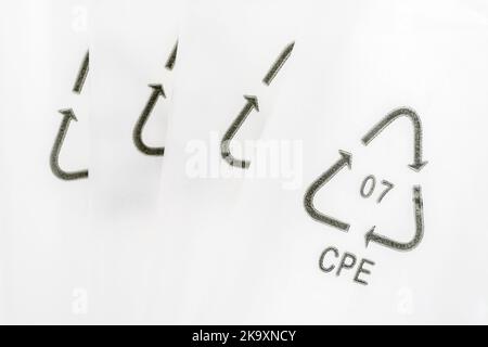 Close-up shot of 07 plastic resin code / Resin Identification Code 7 on plastic packaging. Here CPE refers to the recycling of composite plastics. Stock Photo