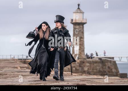 People attend the Whitby Goth Weekend in Whitby, Yorkshire, as hundreds of goths descend on the seaside town where Bram Stoker found inspiration for 'Dracula' after staying in the town in 1890. Issue date: Sunday October 30, 2022. Stock Photo