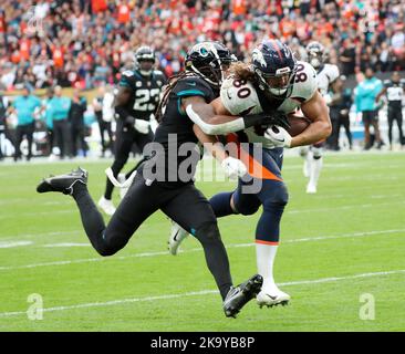 Denver Broncos tight end Greg Dulcich (80) makes a catch during the second  half of an NFL football game against the Denver Broncos Sunday, Dec. 11,  2022, in Denver. (AP Photo/David Zalubowski