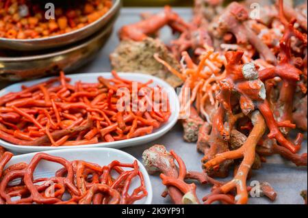 View of pieces of dried red coral, close-up photo. Stock Photo