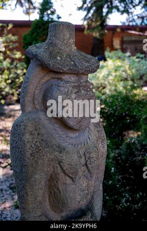 Gods idol statue. View of statue on the background of nature, close-up photo. Stock Photo