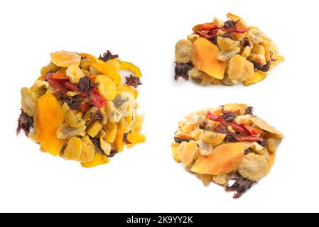 Mix of dried exotic fruit, mangos,slices of pineapples, passion fruit, papaya. Vegetarian dessert. Stock Photo