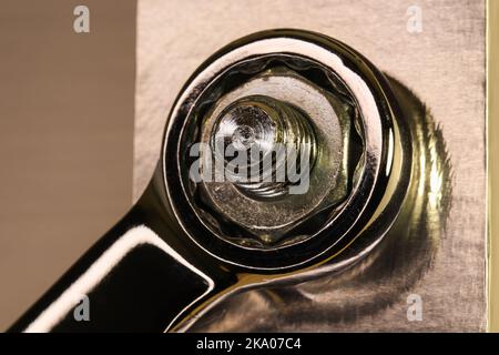 Hex Wrench Tightening Metal Nut To Bolt Stock Photo