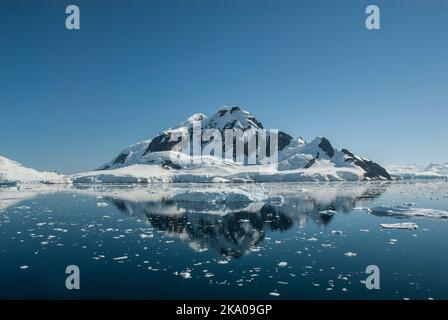 Scientific base with snowy mountains landscape, Antarctic Peninsula. Stock Photo