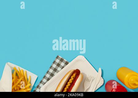 Traditional hot dogs, french fries, drink and sauces. Restaurant menu Stock Photo