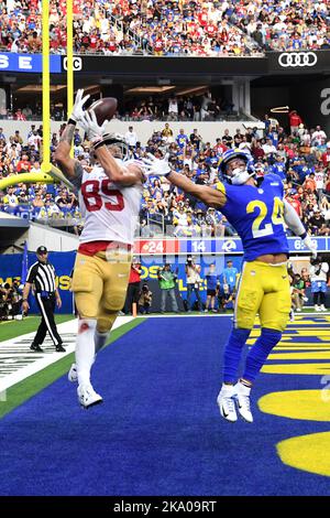 Green Bay, United States. 23rd Jan, 2022. San Francisco 49ers George Kittle  (85) makes a catch in front of Green Bay Packers Preston Smith (91) in the  second half of the NFC