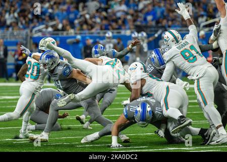 Miami Dolphins defensive back Clayton Fejedelem (42) is up ended