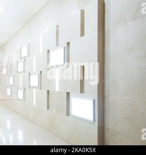 Gallery Interior with empty frames on wall Stock Photo