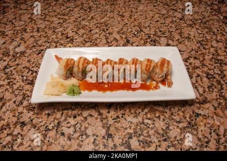 Traditional and authentic Japanese cusine know as a Sushi Roll Stock Photo