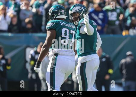 PHILADELPHIA, PA - AUGUST 02: Philadelphia Eagles linebacker Haason Reddick  (7) greets Philadelphia Eagles defensive lineman Javon Hargrave (97) during  training camp on August 2, 2022 at the Novacare Complex in Philadelphia