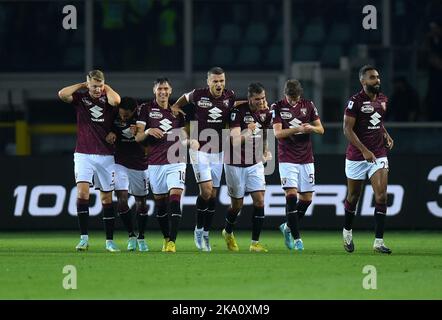 Turin, Italy. 30th Oct, 2022. Torino's Koffi Djidji (1st R) celebrates his goal with teammates during a Serie A football match between AC Milan and Torino in Turin, Italy, Oct. 30, 2022. Credit: Daniele Mascolo/Xinhua/Alamy Live News Stock Photo