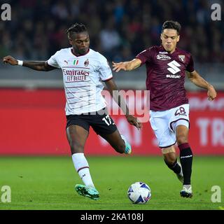 Turin, Italy. 30th Oct, 2022. AC Milan's Rafael Leao (L) vies with Torino's Samuele Ricci during a Serie A football match between AC Milan and Torino in Turin, Italy, Oct. 30, 2022. Credit: Daniele Mascolo/Xinhua/Alamy Live News Stock Photo