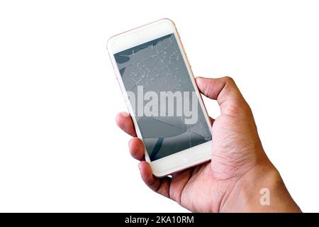 Businessman holding a crack smartphone isolated on white background Stock Photo