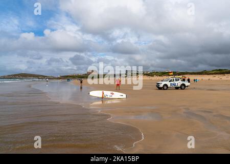 Newquay, United Kingdom - 4 Spetember, 2022: view of Fistral Beach in Newquay with lifeguard watching over swimming zone marked with flags Stock Photo