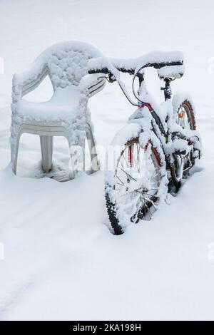 Bicycle covered in snow on a winter day Stock Photo