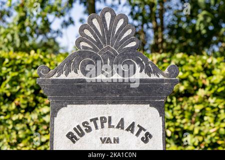 Marum, The Netherlands - September 2, 2022: Old graves with shell symbol at graveyard in Marum in municipality Westerkwartier in Groningen province the Netherlands Stock Photo