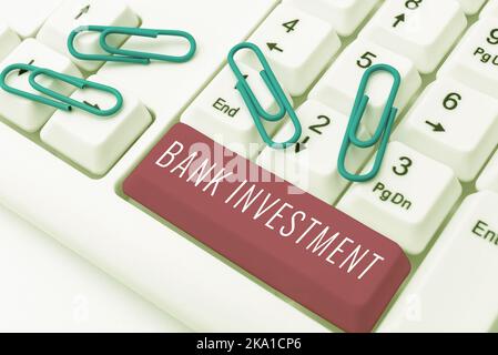 Hand writing sign Bank Investment. Word Written on offering services like bicycle rent or and maintenance Computer Keyboard And Symbol.Information Stock Photo