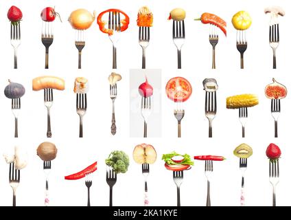 Fruits and vegetables on the forks. Healthy food. Stock Photo