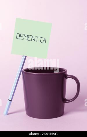 Conceptual display Dementia. Word for examination of anything complicated to understand its nature Notebook With Important Message On Desk With Office Stock Photo