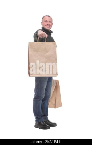 Full isolated studio picture from a man with shopping bags Stock Photo