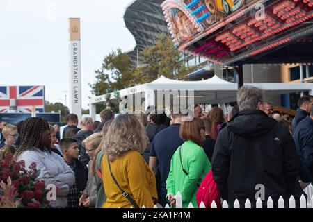 Ascot, Berkshire, UK. 29th October, 2022. Racegoers and their families enjoying the Halloween weekend and funfair at Ascot Races. Credit: Maureen McLean/Alamy Stock Photo