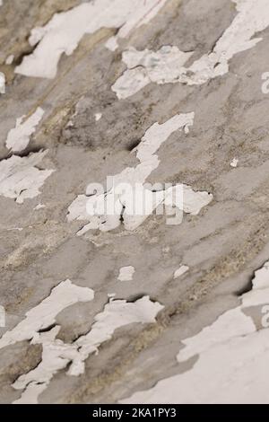 Peeling rotting old ceiling. Cracked damp moldy home surface for renovation Stock Photo