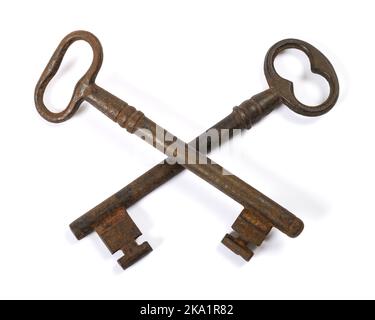 Old Keys crossed isolated on white background Stock Photo
