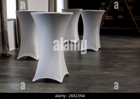 empty round tables and cloth in cafe Stock Photo