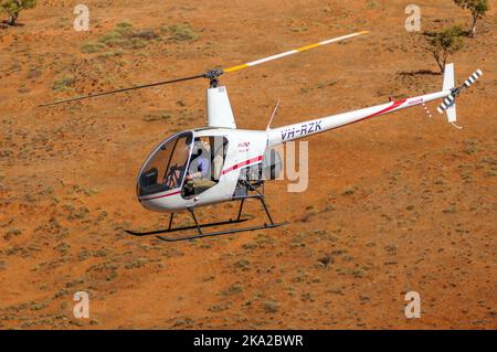 Aerial cattle mustering with a Robinson R22, in the outback of Australia Stock Photo