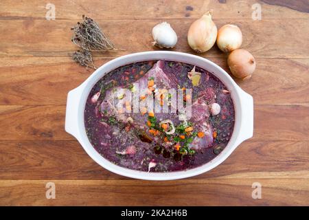 Wild boar marinade in a dish. Stock Photo