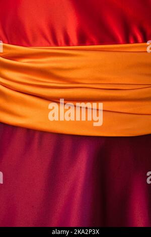 Close up of a bright mix of colorful fabrics Stock Photo