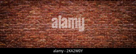 brick wall of red color, wide panorama of masonry Stock Photo