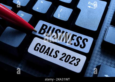 Text caption presenting Business Goals 2023. Word for Setting Higher Standards Aim for the Impossible Computer Keyboard And Symbol.Information Medium Stock Photo