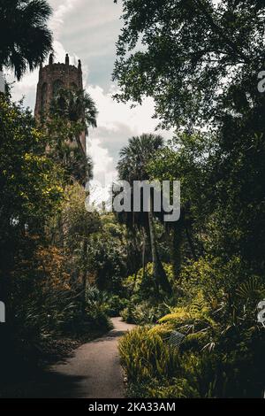 A vertical shot of the footpath in Bok Tower Gardens. Florida, United States. Stock Photo