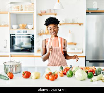 Premium Photo  Cooking utensils. cooking woman in kitchen with frying pan  and wooden spoon. housewife dancing.