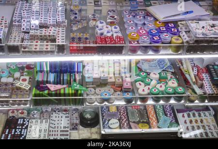 Mahjong tiles and dices at Biu Kee Mah-Jong in Jordan. The old mahjong tile shop is forced to close at the end of October as it is evicted by the Buildings Department.  06OCT22 SCMP/ Edmond So Stock Photo