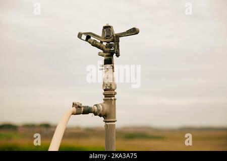 Close-up of a sprinkler irrigation system for the field Stock Photo