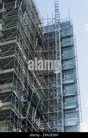 From below scaffolding around modern building during renovations Stock Photo