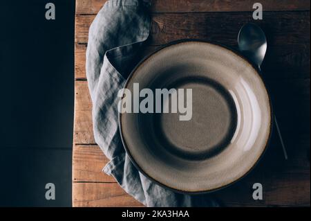 Trendy grey ceramic plates Stock Photo